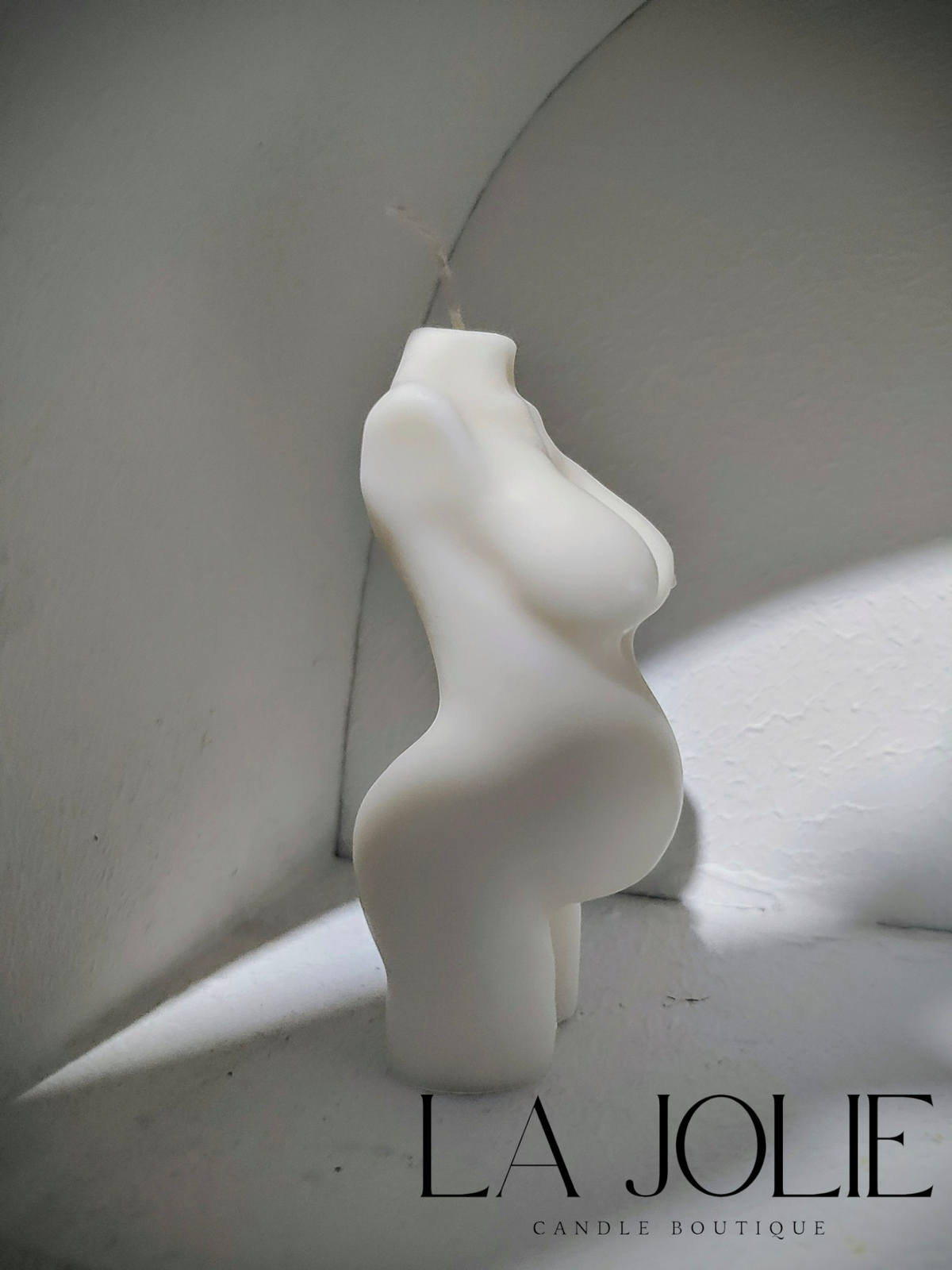 Small pregnant body candle
